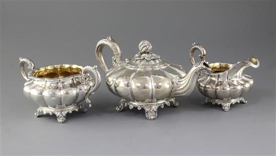 A William IV three piece silver melon shaped tea set, A.B. Savory & Sons, gross 43 oz.